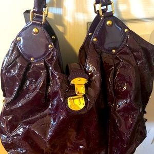 Authentic Louis Vuitton XL Surya bag in purple